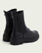 Black leather ankle boots with elastic panels Katia