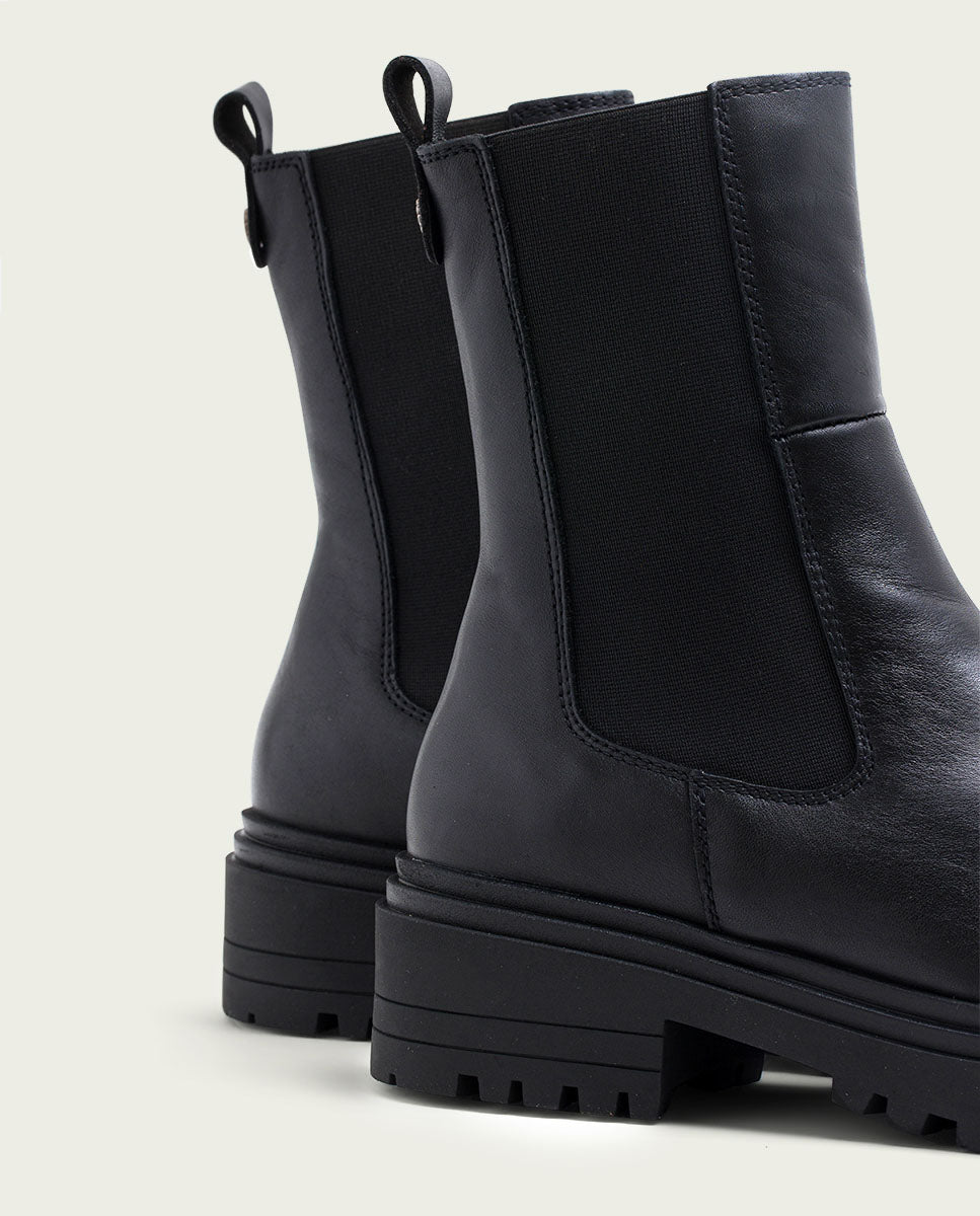 Black leather ankle boots with elastic panels Katia