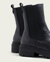 Black leather ankle boots with elastic panels Katia