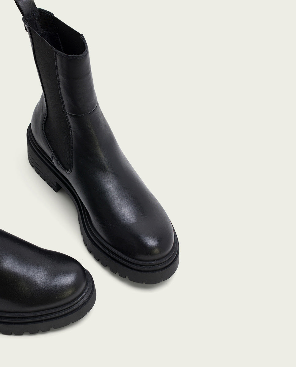 Black leather ankle boots with elastic panels Katia