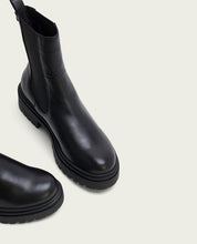 Black leather ankle boots with elastic panels Katia